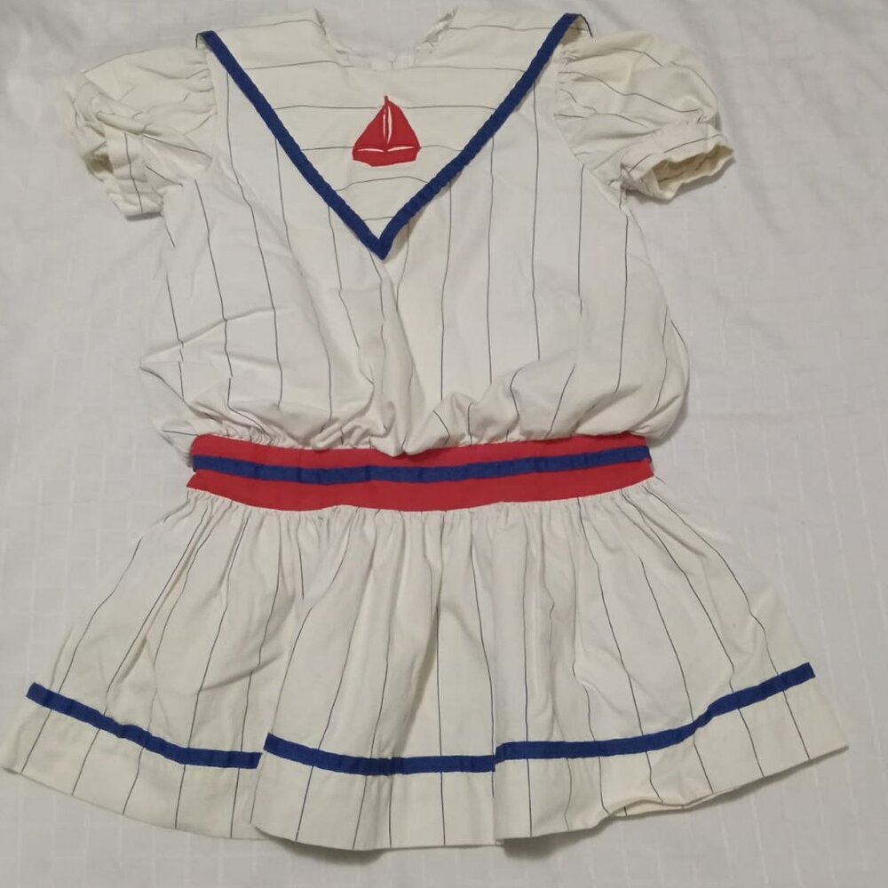 White sailor-style children's vintage dress with blue stripes, 1977